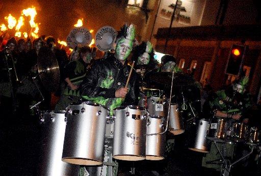 Lewes bonfire societies parade throught town before putting on their bonfire and firework shows.