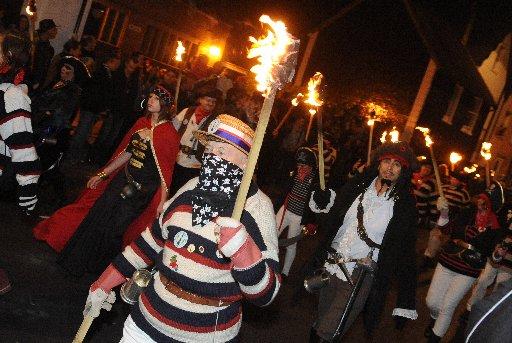 Lewes bonfire societies parade throught town before putting on their bonfire and firework shows.