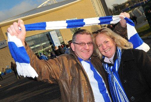 Brighton and Hove Albion's loyal fans cheer their team to victory