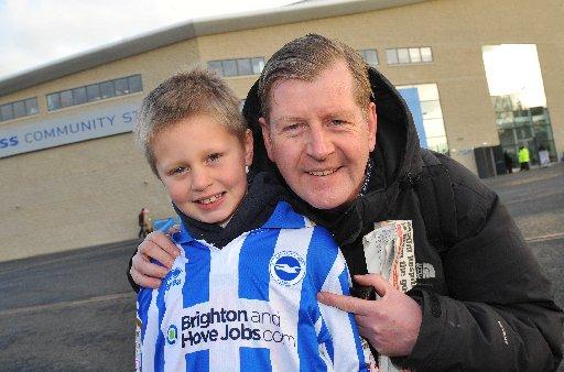 Brighton and Hove Albion's loyal fans cheer their team to victory