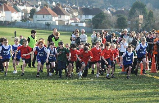 School children warmed up for the Grand Hotel Mini Mile races held at this year's Brighton Marathon