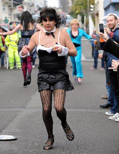 Bonnets and bawdy bets drew the crowds to an Easter parade and street party.
Children, pensioners and drag queens all played their part in fundraising |celebrations in aid |of The Sussex Beacon in Western Street, Brighton, on Sunday.
After a parade of b