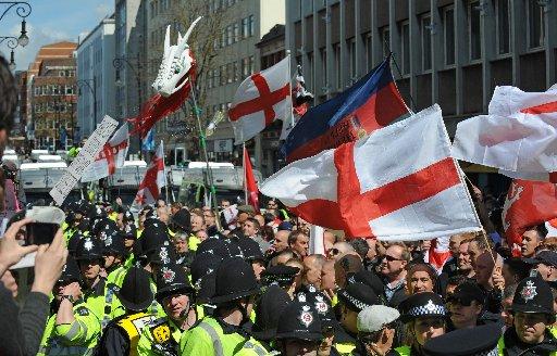Protesters fought hand-to-hand battles with police as they blocked the course of a nationalist march. At least 400 anti-fascist counter-demonstrators prevented up to 140 March for England supporters from following their planned route yesterday. Two police