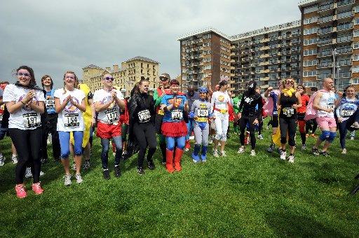 Batman, Swamp Thing and Charlie Chaplin were just some of the colourful characters taking a charitable run along the seafront.
About 1,400 runners, many in fancy dress, were taking part in the biggest Heroes Run ever from Hove Lawns yesterday.
The event