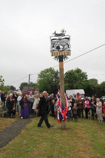 Isfield has a new sign to celebrate the Diamond Jubilee. It was unveiled by the High Sheriff 