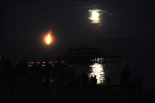 Night skies glowed as dozen of Jubilee beacons were set ablaze across Sussex. 
Thousands of people flocked to watch the fires on Monday night which formed part of a 'chain of light' to celebrate 60 years of the Queen's reign. 