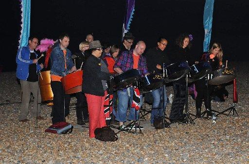 Night skies glowed as dozen of Jubilee beacons were set ablaze across Sussex. 
Thousands of people flocked to watch the fires on Monday night which formed part of a 'chain of light' to celebrate 60 years of the Queen's reign. 