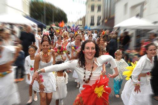Up to 20,000 people attended a community festival full of fun, frolics, food and flowers.
Streams of crowds meandered up and down the kilometre stretch of closed road at the Kemp Town Carnival.
With five stages of bands, this was the biggest the annual 