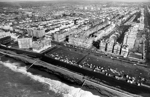 Beach huts strewn across Hove seafront