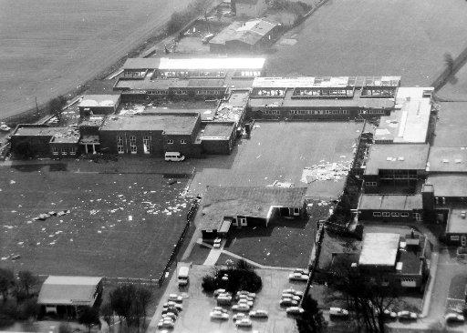 Woodingdean School with debris strewn across the grounds 