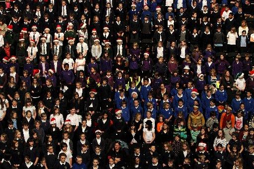 More than 1,200 primary school children from Brighton and Hove delighted family and friends at a massed carol concert at the Brighton Centre