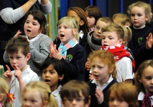 Children from Bevendean Primary School in Heath Hill Avenue, Brighton, joined with thousands of others across the UK in a bid to break the world record for singing and signing
