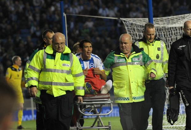 Leo Ulloa is stretchered off last night. Picture by Simon Dack
