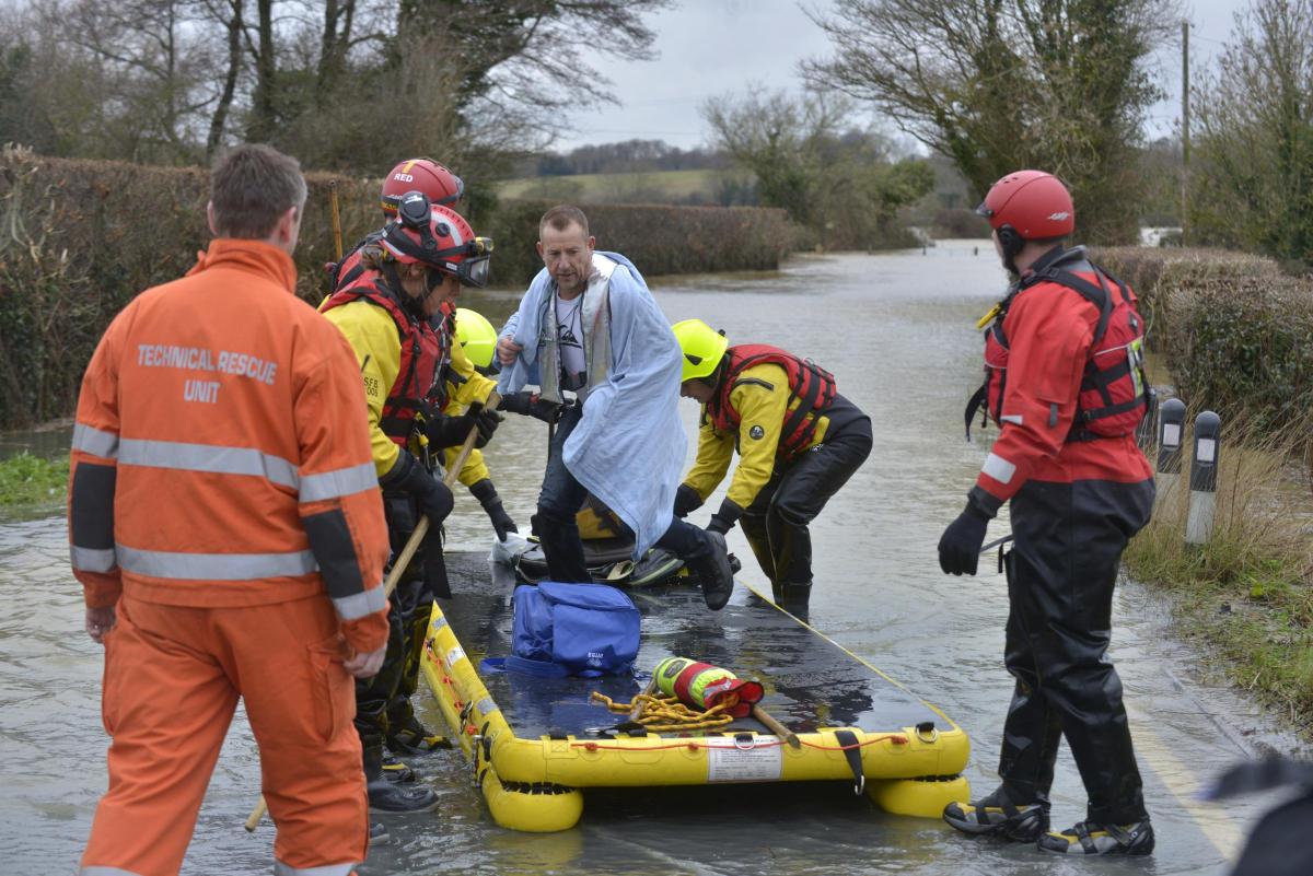 A family were trapped by floodwater on Barcombe Mills Road and were rescued by emergency services