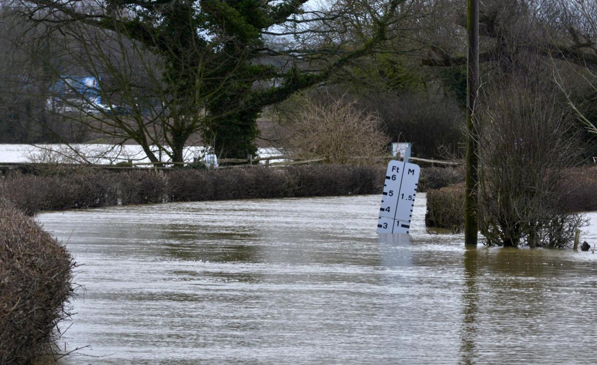 A family were trapped by floodwater on Barcombe Mills Road and were rescued by emergency services.