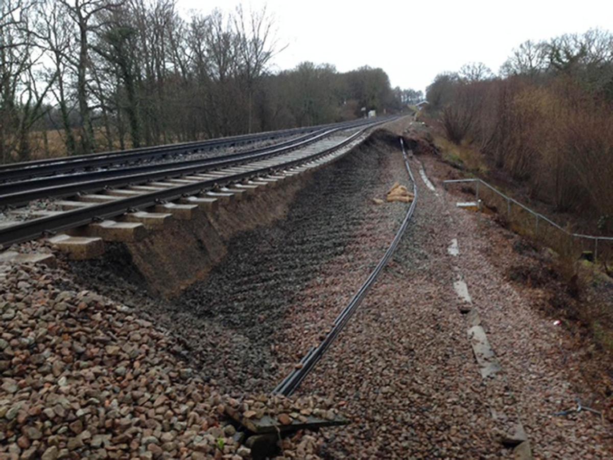 photo issued by Network Rail of damage caused to track near Stonegate, Sussex following a landslip 