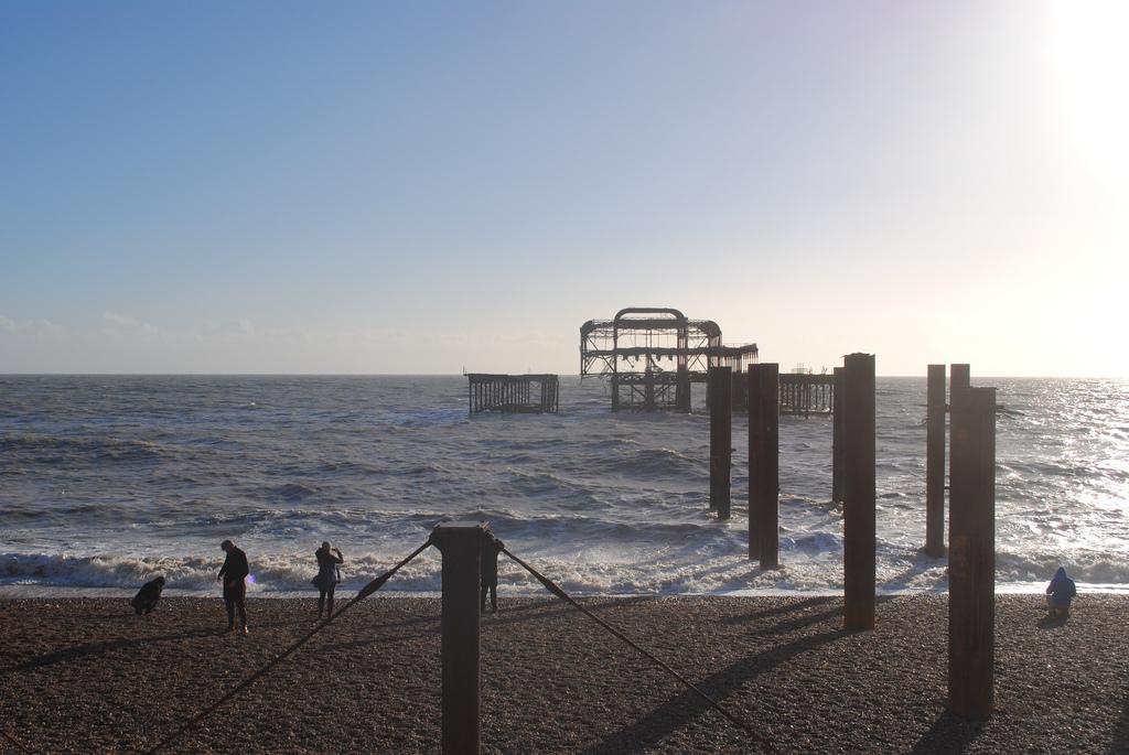 People taking pictures of the West Pier. By Chris Limb