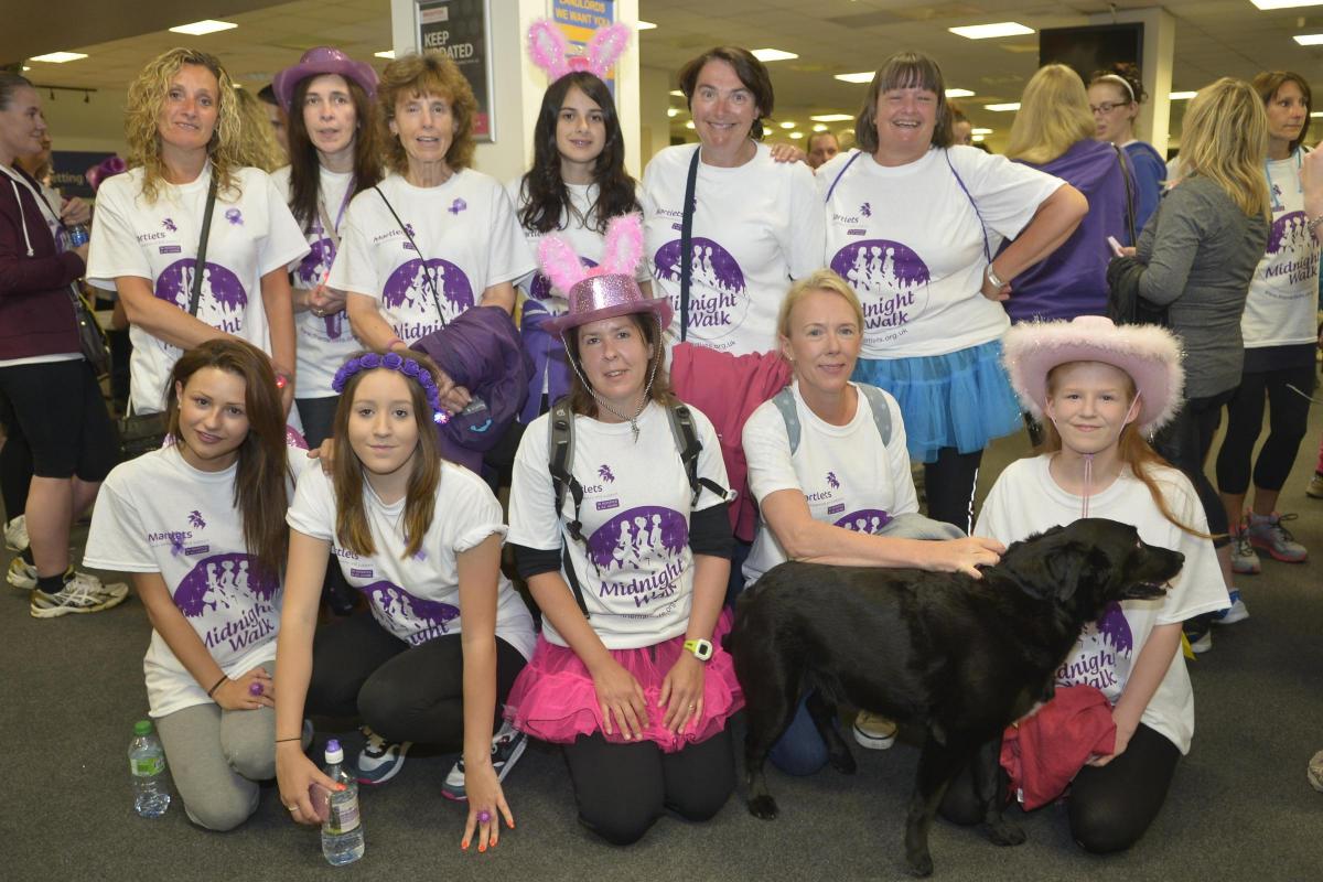 HUNDREDS of women enjoyed a girl’s night out with a difference as they walked 13 miles for charity – powering through a late-night storm.
The heavens opened as more than 600 determined walkers took on the Martlets Midnight Walk challenge on Friday ni