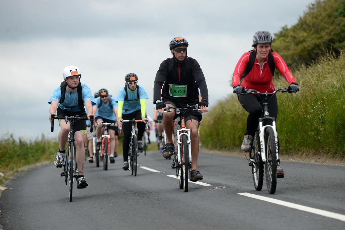 TENS of thousands of cyclists streamed across the South Downs this weekend as they took on a 54-mile charity cycle challenge.
Now in its 39th year, The London to Brighton Bike Ride is the oldest and largest charity ride in Europe – having raised £60 m