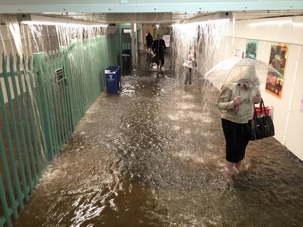 Mark Pawlak sent us this picture of Commuters flooded in Worthing train station underpass.
