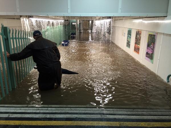 Mark Pawlak sent us this picture of Commuters flooded in Worthing train station underpass.