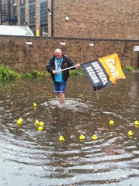 Flooding in GMB car park, Donald rescues family of ducks from drowning in tides caused by vehicles.