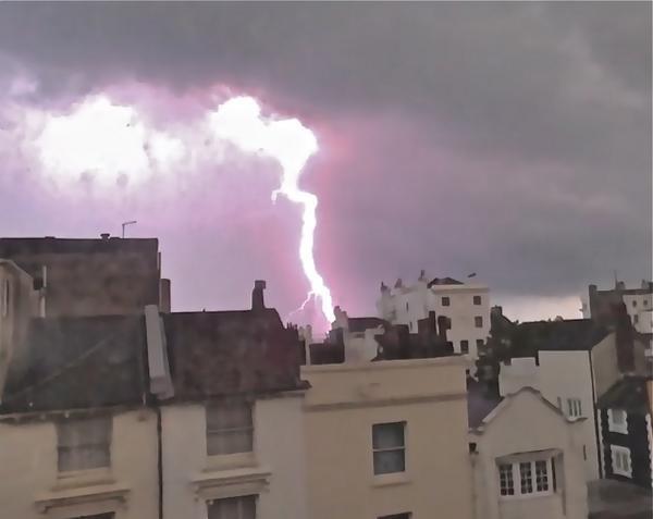 The Argus: The storm flashing over Brighton - picture by Darrison