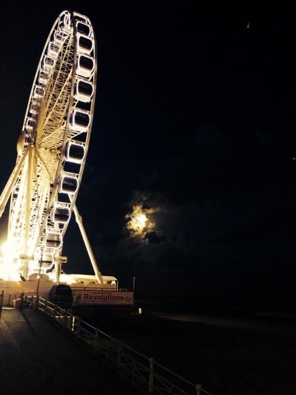 Chasing the supermoon over Brighton.