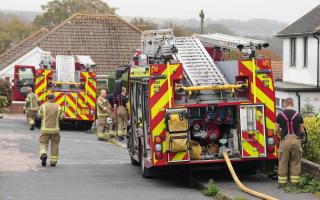 Updates as fire crews battle house fire in town centre