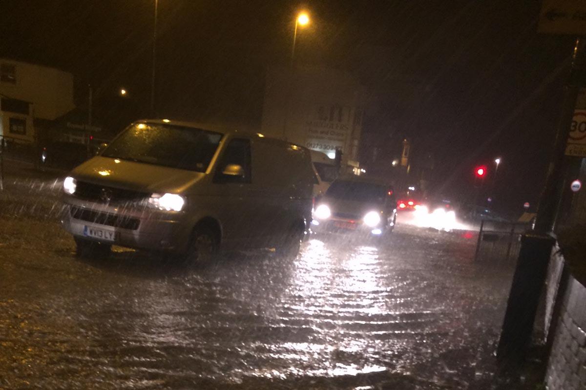 Flooding in Rottingdean High Street. Picture by Madisson Chapman