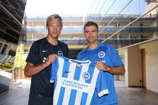 Aaron Hughes unveiled as new Albion signing with boss Sami Hyypia, left. (July 14, 2014). Picture: BHAFC