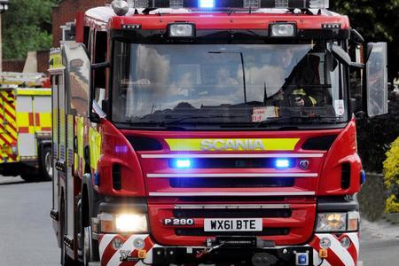 Four fire engines tackle large blaze at outbuilding