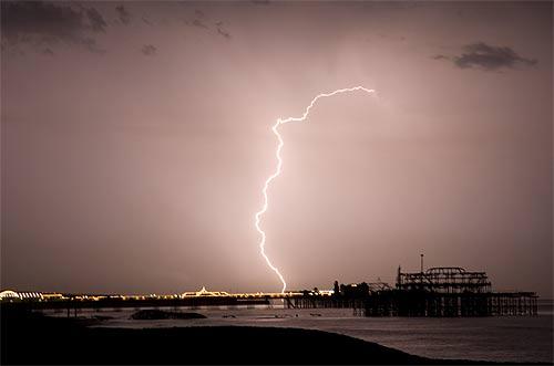 Lightning over Brighton's Piers
