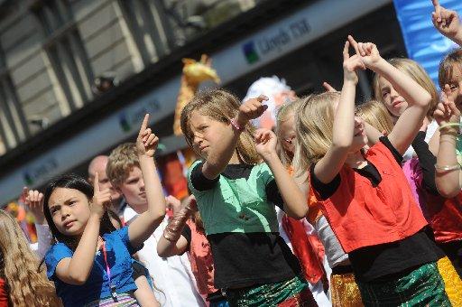 A vibrant array of colours and costumes paraded through the streets for Brighton Festival’s energetic curtain raiser. Here are pictures taken by our photographer Tony Wood, and many more submitted by readers.