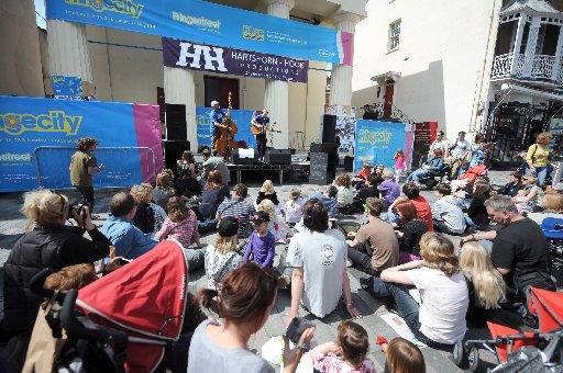 Festival Fringe performers showcase their performances a the Fringe City event in the city centre on May 9.