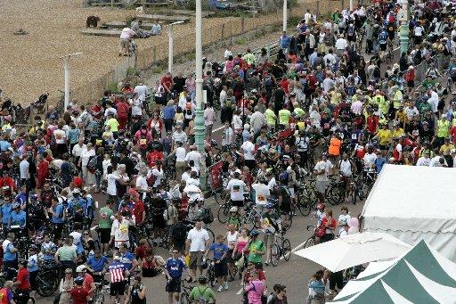 They may have been saddle-sore but most of them still managed a smile after pedalling 54 miles across the county. More than 27,000 cyclists had set off from Clapham Common at 6am today morning for the annual trek to Brighton seafront - taking in the notor
