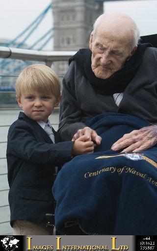 Mr Allingham with his great-grandson Erik Carlson, aged 3, at a party to celebrate his 113th birthday organised by the Royal Navy.