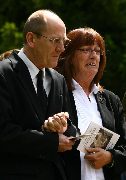 The parents of Private John Brackpool, Alan Brackpool (left) and Carol Brackpool (right) leave St John's Chuch. 