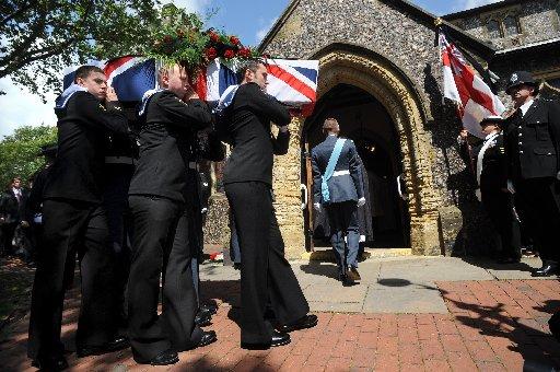 Henry Allingham's coffin is taken into the Parish Church of St Nicholas' of Myra.