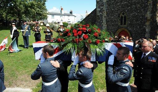 The Last Post is played for Henry Allingham at his funeral today held at the Parish Church of St Nicholas' of Myra.
