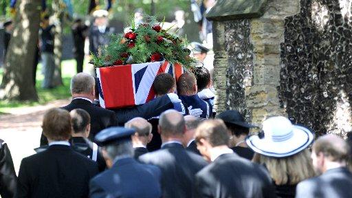 Henry's coffin leaves the church