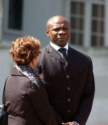 Chris Eubank arrives to pay his respects at today's funeral.