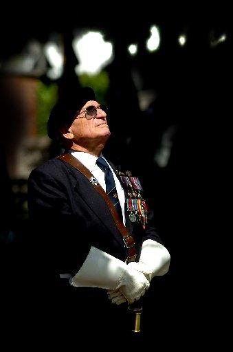 A veteran looks to the skies in thought.