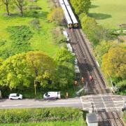 Passengers were evacuated from a train after it hit a level crossing barrier near Billingshurst this morning
