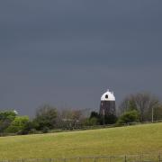 Dark skies over the Jack windmill in Clayton, near Hassocks