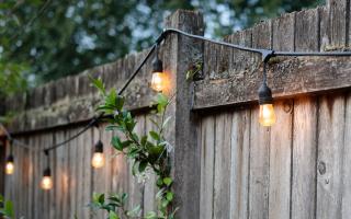Check to see if you can hang or attach items to a neighbour's fence.