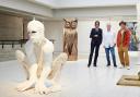 Nick Cave, Thomas Houseago and Brad Pitt at the exhibition at the Sara Hilden Art Museum in Finland: credit : PA/Sara Hilden Art Museum
