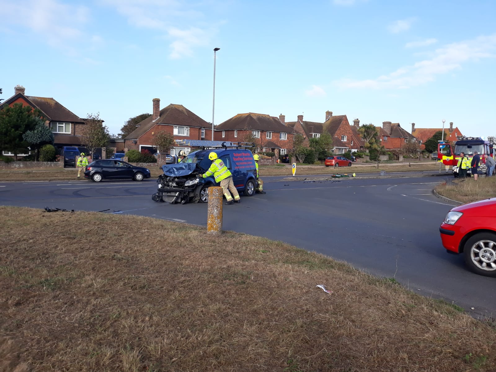 Fire brigade and police at A259 crash, Beacon Road, Seaford