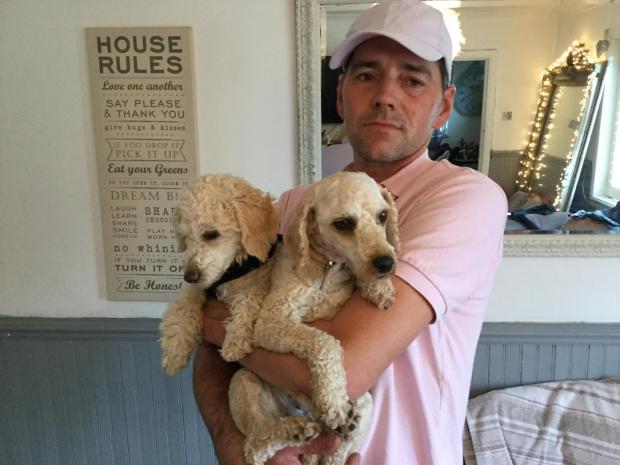 The Argus: Mr Cole-McCue and the two poodles