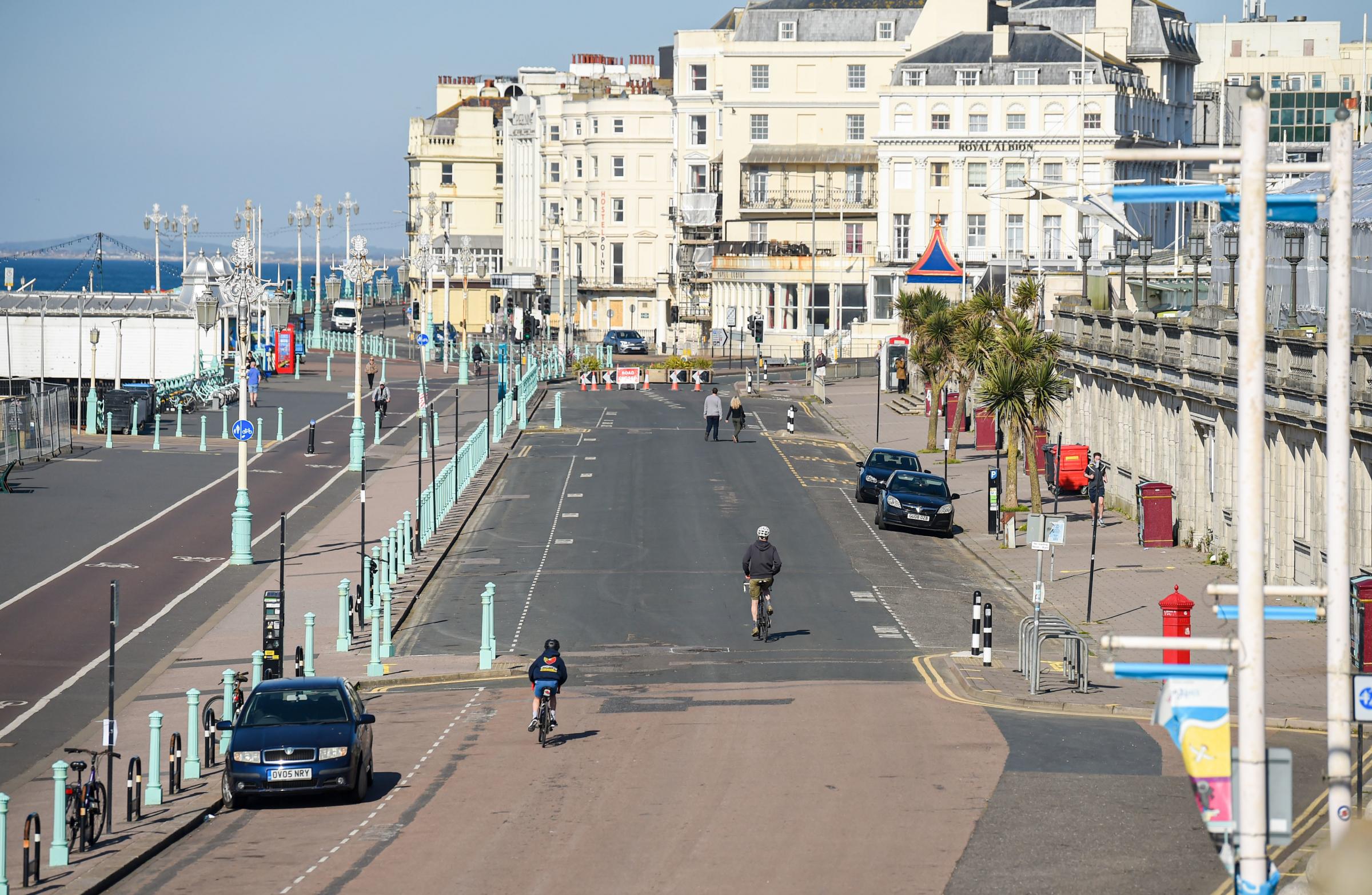 Brighton UK 20th April 2020 - Madeira Drive on Brighton seafront has been closed by the city council to traffic between 8am and 8pm for the next three weeks to allow cyclists and pedestrians to exercise in safer conditions during the Coronavirus